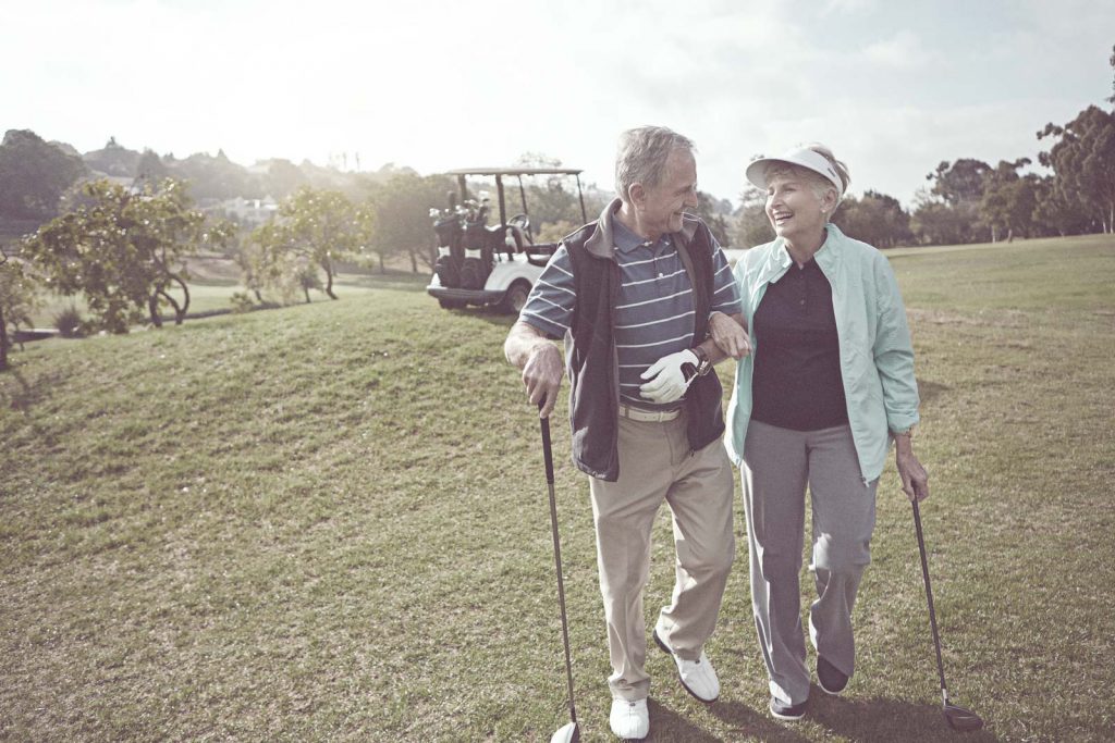 Retired Couple Playing Golf | TIB Financial Group